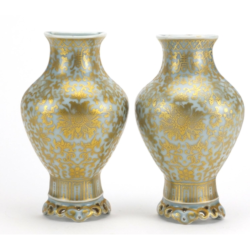 441 - Pair of Chinese porcelain wall vases, finely gilded with flower heads amongst foliate scrolls, six f... 