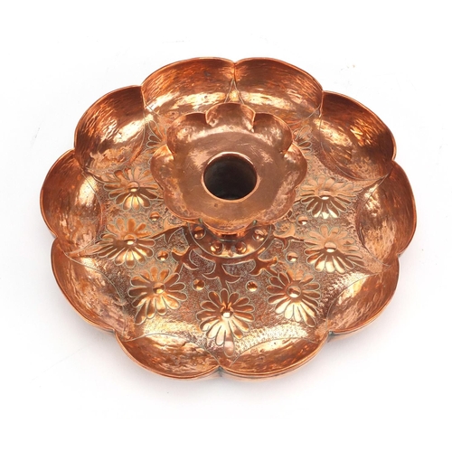 796 - Arts & Crafts copper candlestick by Keswick, embossed with stylised flowers, impressed marks, 18cm i... 