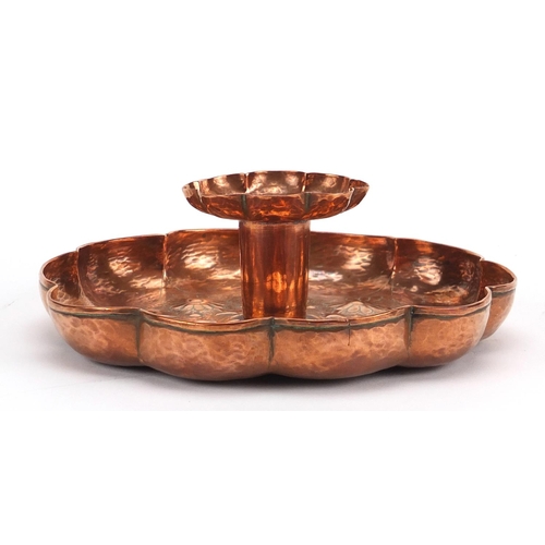 796 - Arts & Crafts copper candlestick by Keswick, embossed with stylised flowers, impressed marks, 18cm i... 