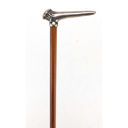 112 - Tiffany & Co sterling silver and malacca walking stick with antler design handle, 88cm in length