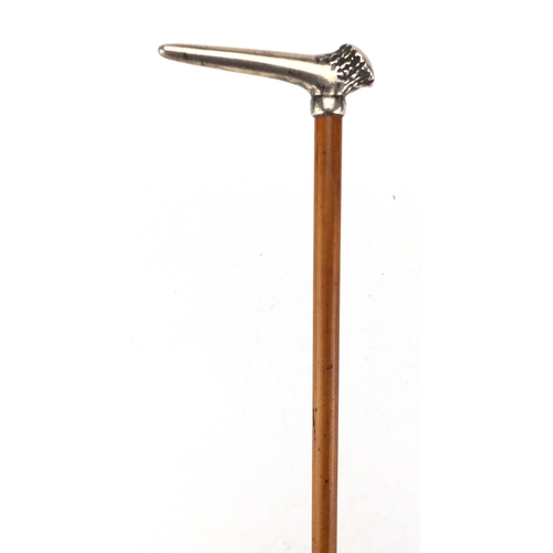 112 - Tiffany & Co sterling silver and malacca walking stick with antler design handle, 88cm in length