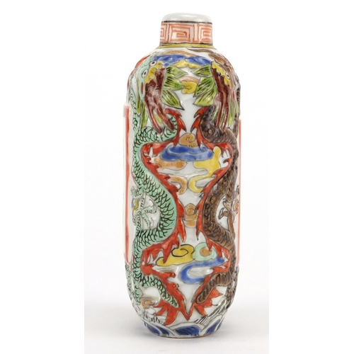 428 - Chinese porcelain relief snuff bottle, hand painted in the famille verte palette with dragons and ca... 