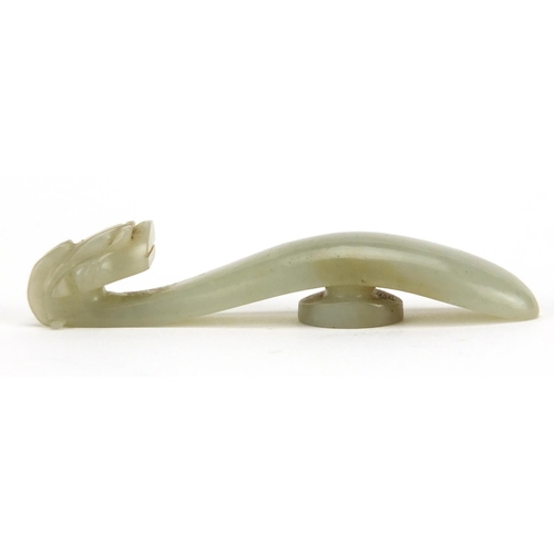 528 - Chinese pale green jade dragon belt hook, 8.5cm in length