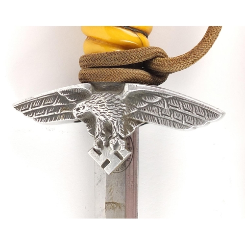 364 - German Military interest Luftwaffe dirk with scabbard by Rich ABR Herder, 42.5cm in length