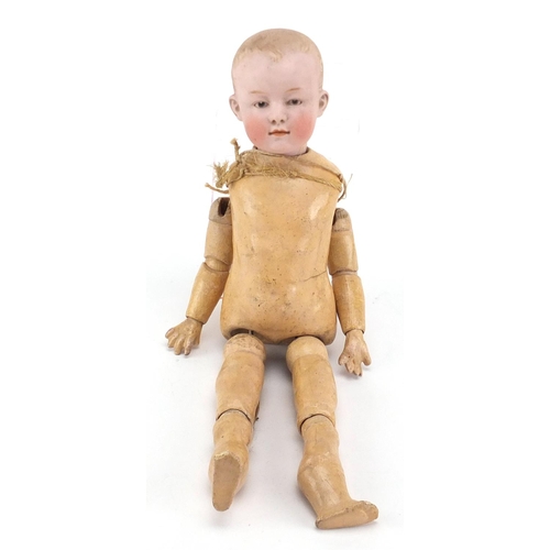 147 - 19th century German bisque headed doll of a boy, with jointed limbs, impressed Germany to the back o... 