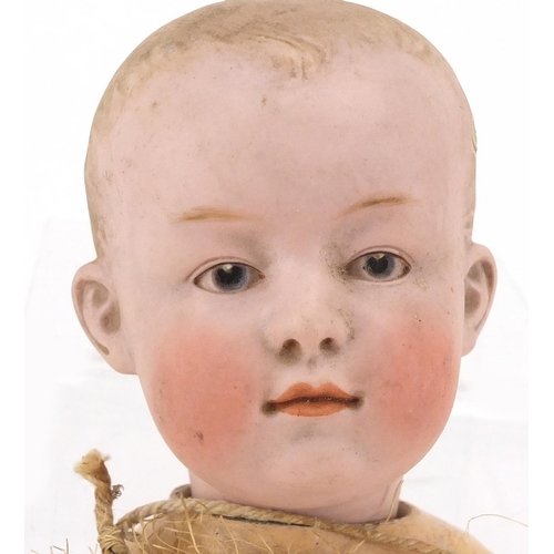 147 - 19th century German bisque headed doll of a boy, with jointed limbs, impressed Germany to the back o... 