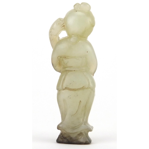 527 - Chinese celadon and russet jade carving of a female, 7.5cm high