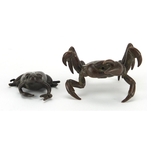 577 - Japanese patinated bronzes comprising a crab and a frog, the crab with character marks to the unders... 