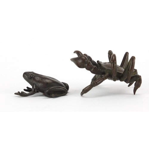 577 - Japanese patinated bronzes comprising a crab and a frog, the crab with character marks to the unders... 