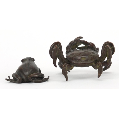 577 - Japanese patinated bronzes comprising a crab and a frog, the crab with character marks to the unders... 