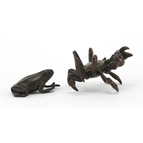 577 - Japanese patinated bronzes comprising a crab and a frog, the crab with character marks to the unders... 