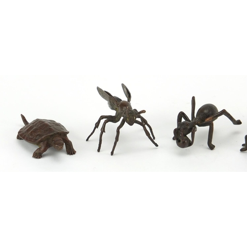 576 - Four Japanese patinated bronze insects and a tortoise, some with impressed character marks, the larg... 