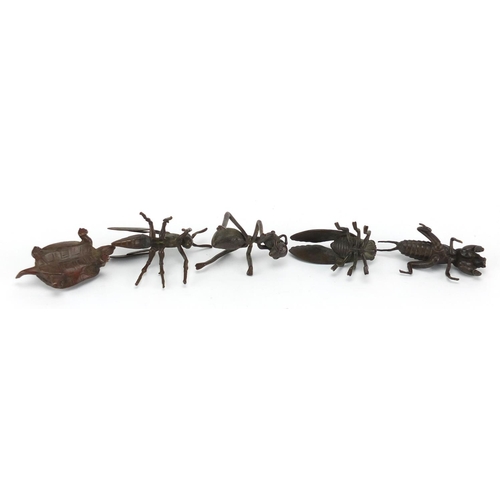 576 - Four Japanese patinated bronze insects and a tortoise, some with impressed character marks, the larg... 