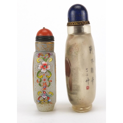 537 - Two Chinese glass snuff bottles with stoppers, one enamelled with butterflies amongst flowers, the o... 