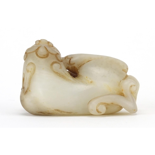 526 - Chinese white and russet jade carving of a lion, 7cm wide