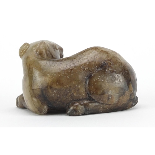 529 - Chinese russet and white jade carving of a foal, 8.5cm wide