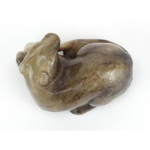 529 - Chinese russet and white jade carving of a foal, 8.5cm wide