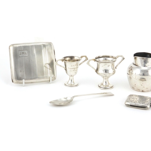 901 - Georgian and later silver including two cigarette cases, vesta and two miniature twin handled trophi... 