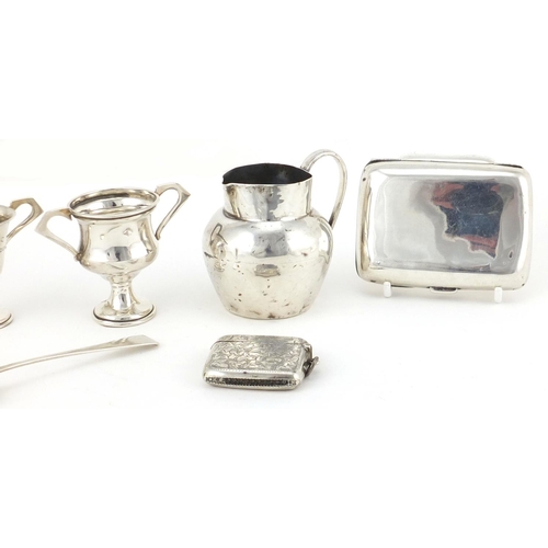 901 - Georgian and later silver including two cigarette cases, vesta and two miniature twin handled trophi... 