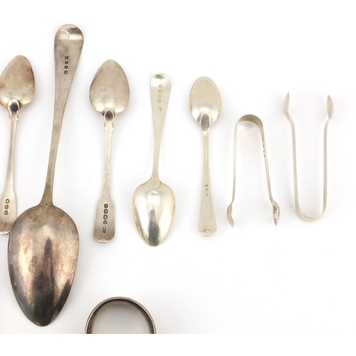 902 - Georgian and later silver spoons, sugar tongs and napkin ring,including a tablespoon, various hallma... 