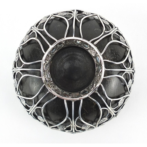 877 - Unmarked silver coconut footed bowl, set with miniature middle Eastern coins, 6cm high x 9cm in diam... 