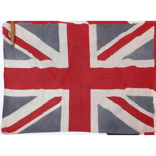 360 - Three British Ensign flags, including one with pole, two stamped British made, the largest 165cm x 1... 