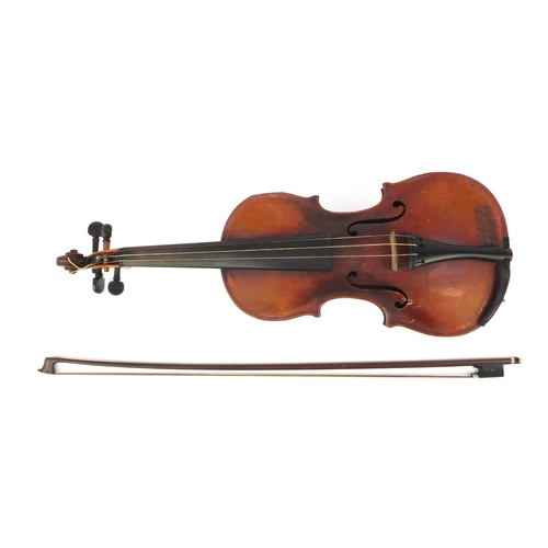 136 - Old wooden violin with bow and case, bearing a Music House paper label, the violin back 13.5inches i... 