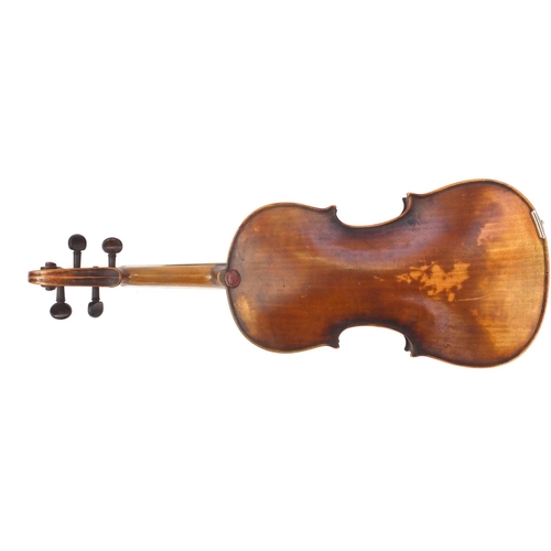 135 - Old wooden violin with one piece back, wax seal, bow and tooled leather case, the violin bearing an ... 