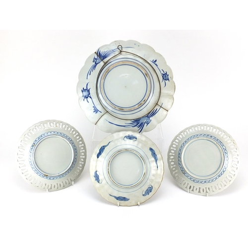 504 - Japanese Imari porcelain including a charger and a pair of plates with pierced borders, hand painted... 