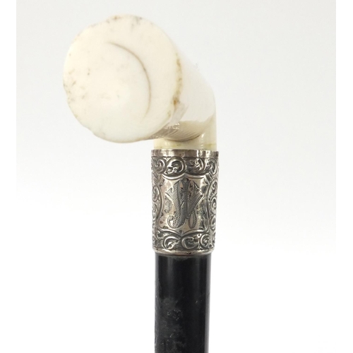 114 - Ebonised walking stick with ivory handle and silver collar, J H Birmingham 1876, 88cm in length