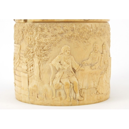 107 - 19th century French cylindrical ivory pot and cover, finely carved with three figures around a table... 