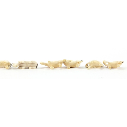 520 - Eight Chinese carved ivory horses, the largest 5cm in length