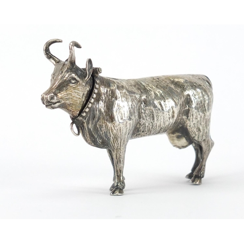 846 - Antique continental silver model of a bull with hinged head, 8.7cm in length, approximate weight 58.... 