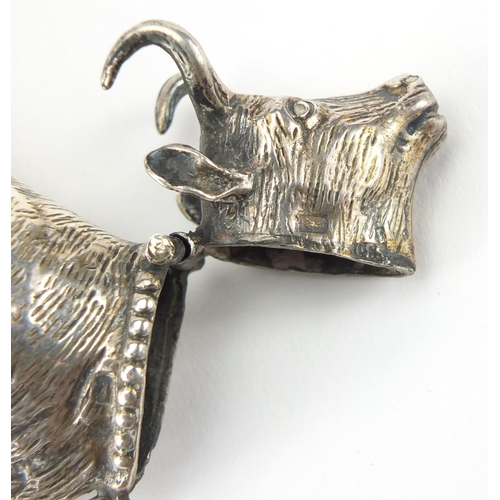 846 - Antique continental silver model of a bull with hinged head, 8.7cm in length, approximate weight 58.... 