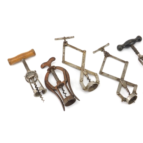 90 - Seven antique and later corkscrews including James Heeley & Sons A1 double lever and two perfect con... 