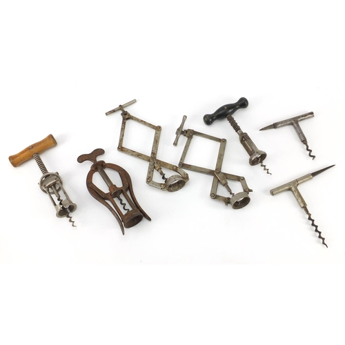 90 - Seven antique and later corkscrews including James Heeley & Sons A1 double lever and two perfect con... 