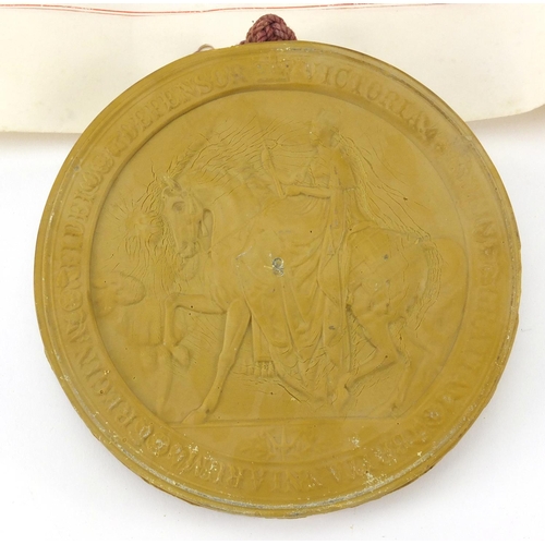 267 - Large antique wax seal attached to a vellum document, the seal 16.5cm in length