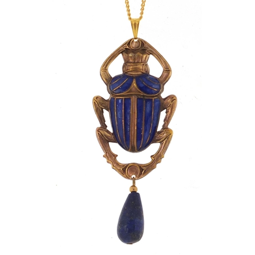 818 - Egyptian Revival jewellery comprising an enamelled beetle pendant with lapis lazuli drop on chain an... 