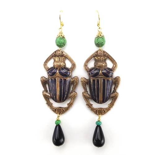 818 - Egyptian Revival jewellery comprising an enamelled beetle pendant with lapis lazuli drop on chain an... 