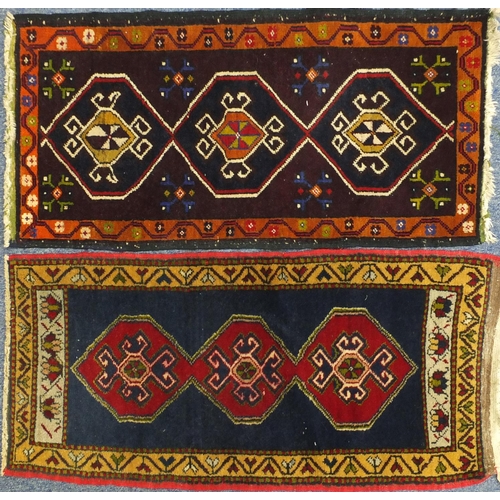 2152 - Two Turkish Yastik rugs, each approximately 100cm x 48cm