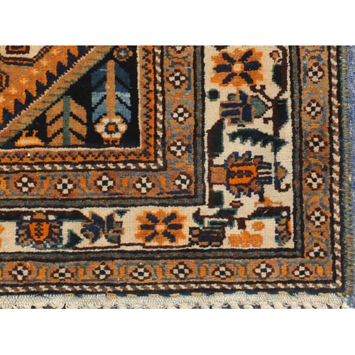 2061 - Rectangular North West Persian Yalameg rug, the central field having a flower and bird design onto a... 