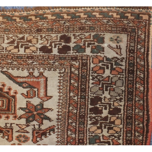 2125 - Rectangular South Persian rug, the central field having a camel and bird design within floral border... 