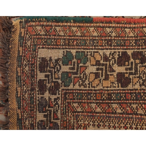 2125 - Rectangular South Persian rug, the central field having a camel and bird design within floral border... 