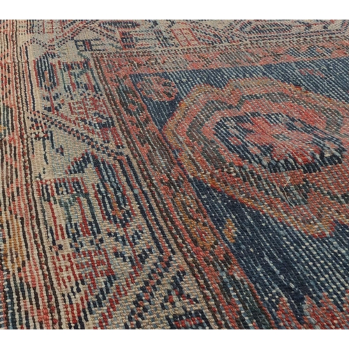 2135 - Rectangular Persian Melayer rug the central field having an all over floral design onto a midnight b... 