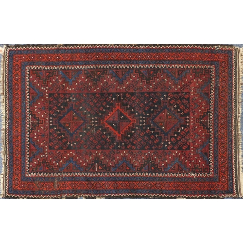 2148 - Rectangular Afghan Baluch rug having an all over stylised floral design within corresponding borders... 