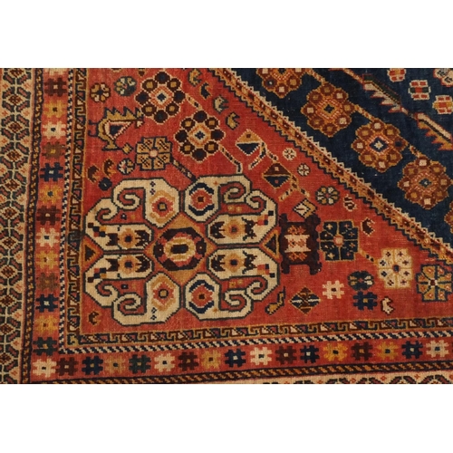 2032 - Rectangular Persian Kashgan rug, having and all over stylised design, 214cm x 138cm