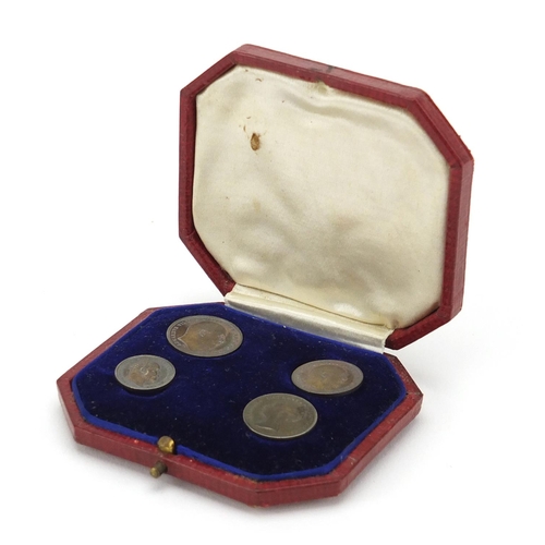2805 - Edward VII 1904 part Maundy coin set, housed in a tooled leather case and one other
