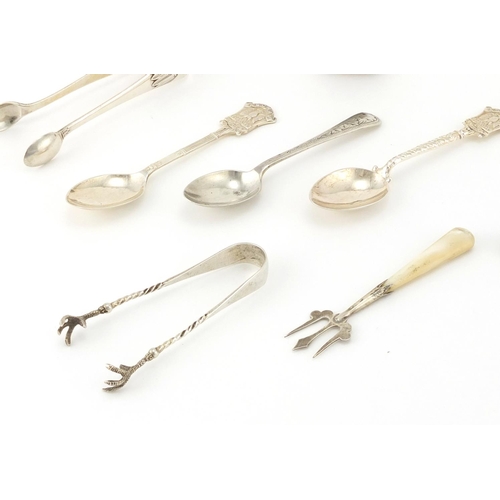 2873 - Silver items comprising three pairs of sugar tongs, three teaspoons, mustard spoons, pickle fork and... 