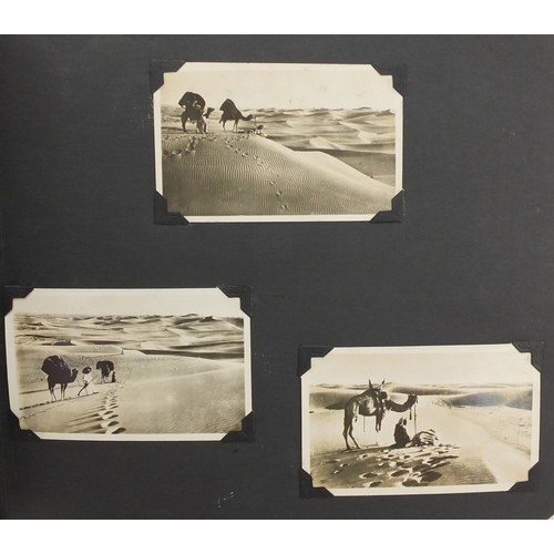 297A - Mostly early 20th century black and white photographs, some Military arranged in two albums includin... 