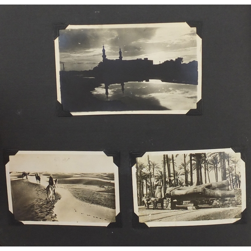 297A - Mostly early 20th century black and white photographs, some Military arranged in two albums includin... 